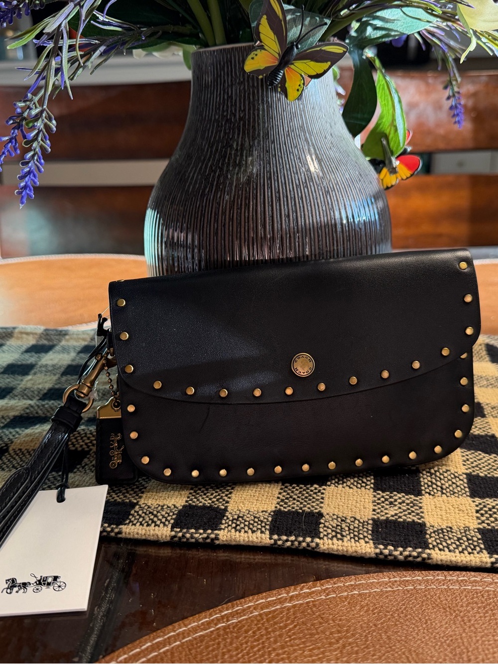 Coach 1941 Border Rivets Clutch from 2018 style 29765. NWT